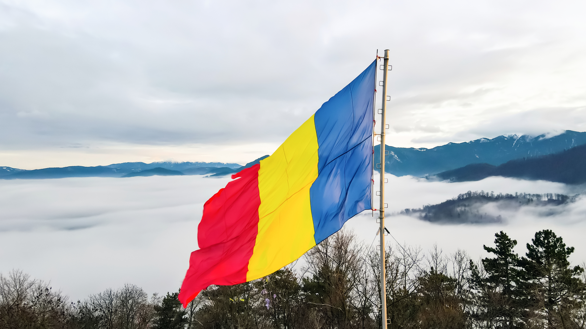 National flag on the top of the hill in Brasov, Romania